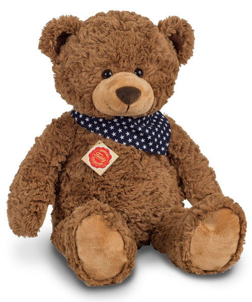 Brown teddy bear with star print scarf by Teddy Hermann